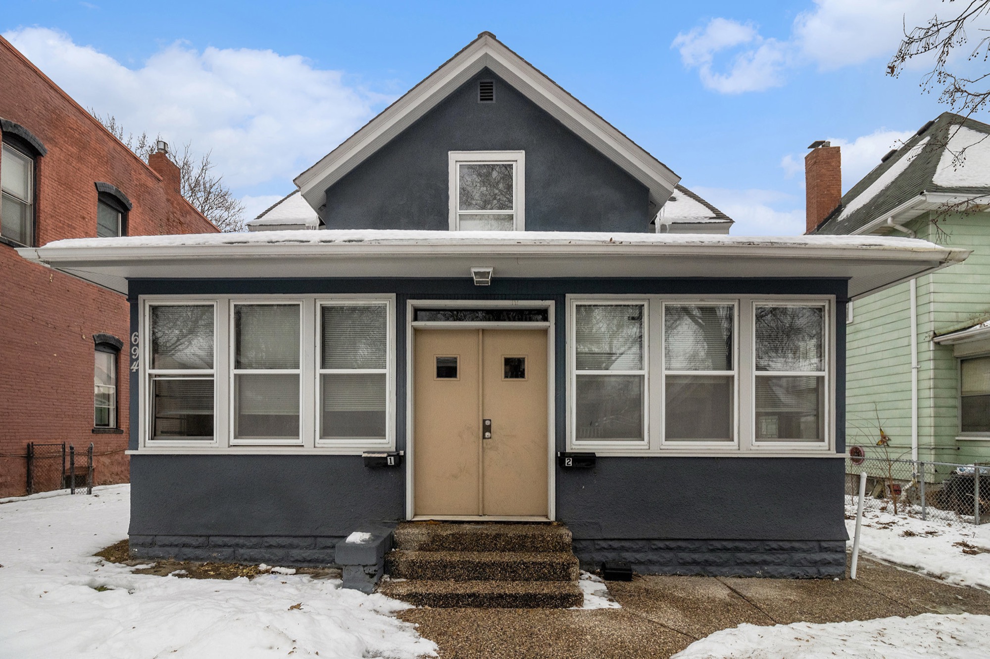 A restored craftsman home in a Verus Praedium neighborhood